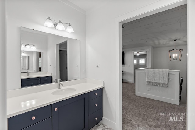 bathroom with vanity and ceiling fan