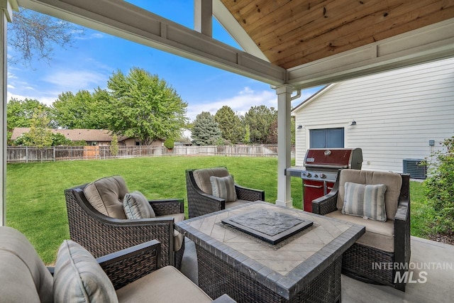 view of patio / terrace with area for grilling and central AC unit