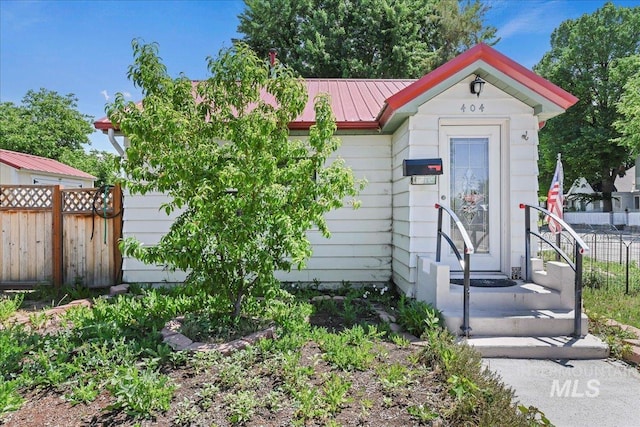 404 W 5th St, Weiser, ID 83672 - view of front of house with metal roof