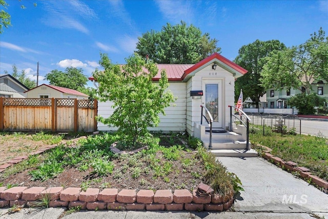 404 W 5th St, Weiser, ID 83672 - view of front of house featuring metal roof