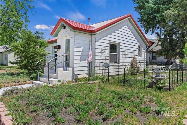404 W 5th St, Weiser, ID 83672 - view of property exterior with metal roof