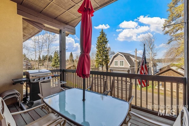 1391 Greystone Dr, Mccall, ID 83638 - wooden deck with outdoor dining space and grilling area