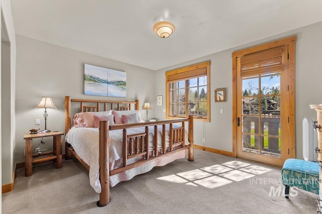 1391 Greystone Dr, Mccall, ID 83638 - bedroom featuring access to outside, carpet floors, and baseboards