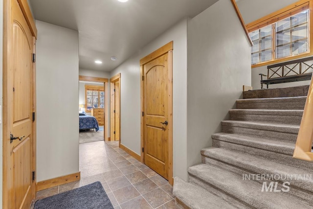 1391 Greystone Dr, Mccall, ID 83638 - stairway with recessed lighting and baseboards