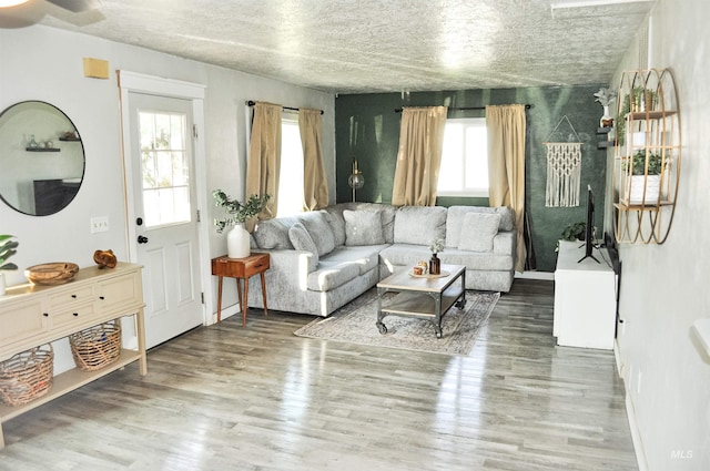 611 E Hawaii Ave, Nampa, ID 83686 - living room featuring wood finished floors and a textured ceiling