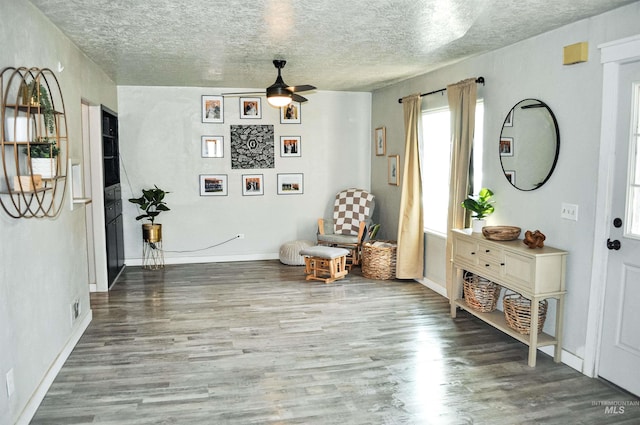 611 E Hawaii Ave, Nampa, ID 83686 - sitting room with ceiling fan, wood finished floors, and a textured ceiling