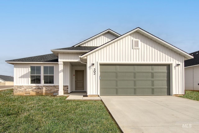 modern inspired farmhouse with a garage, concrete driveway, roof with shingles, board and batten siding, and a front yard