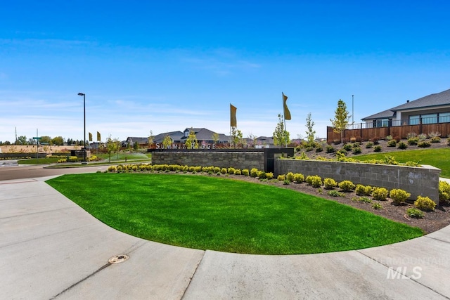 exterior space featuring fence and a yard