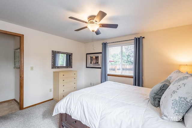 bedroom featuring carpet floors, baseboards, and ceiling fan
