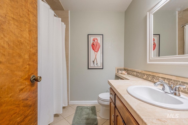 full bathroom featuring decorative backsplash, tile patterned floors, baseboards, vanity, and toilet