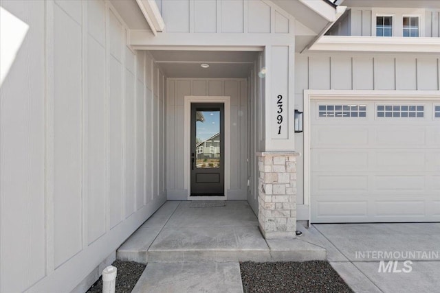2391 E Snocreek Dr, Eagle, ID 83616 - property entrance with a garage and board and batten siding