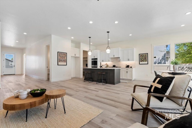2391 E Snocreek Dr, Eagle, ID 83616 - living area featuring recessed lighting, light wood-style flooring, and plenty of natural light