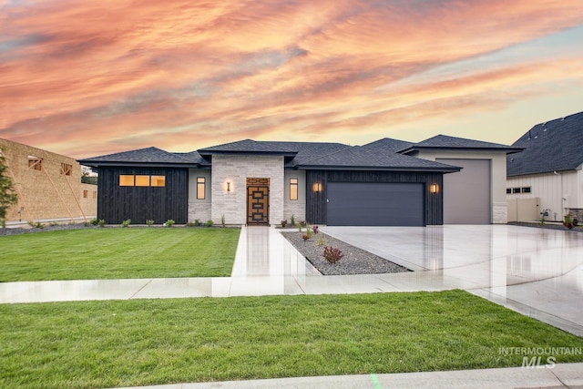 6241 W Strant St, Eagle, ID 83616 - view of front facade with a garage, driveway, a yard, and a shingled roof