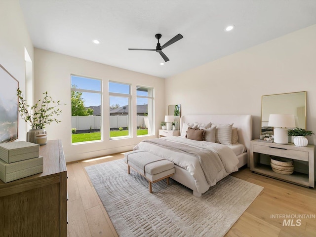 6241 W Strant St, Eagle, ID 83616 - bedroom with light wood-type flooring, recessed lighting, and a ceiling fan