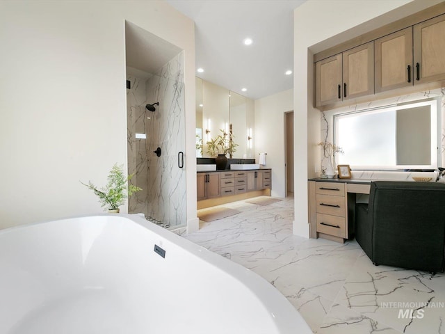 6241 W Strant St, Eagle, ID 83616 - full bath featuring vanity, marble tiled flooring, a marble finish shower, a soaking tub, and recessed lighting