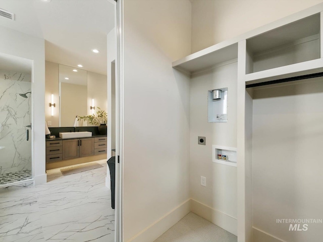 6241 W Strant St, Eagle, ID 83616 - washroom featuring hookup for an electric dryer, washer hookup, a sink, recessed lighting, and baseboards
