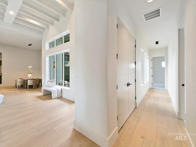 6241 W Strant St, Eagle, ID 83616 - corridor featuring light wood-style floors, beamed ceiling, baseboards, and recessed lighting