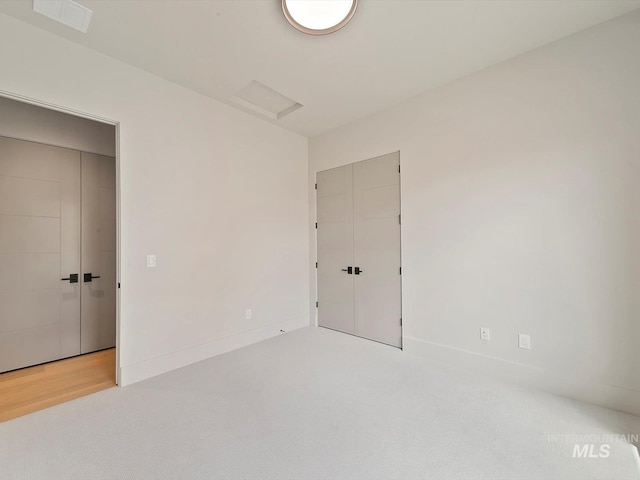 6241 W Strant St, Eagle, ID 83616 - carpeted spare room featuring attic access and baseboards
