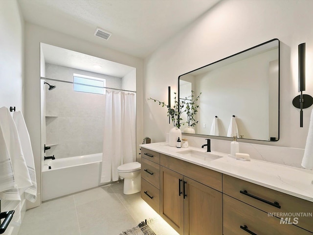 6241 W Strant St, Eagle, ID 83616 - bathroom featuring vanity, toilet, shower / bath combination with curtain, and tile patterned flooring