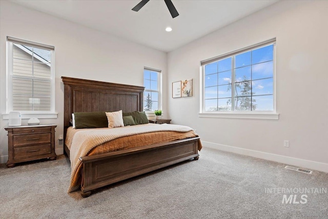 carpeted bedroom with ceiling fan