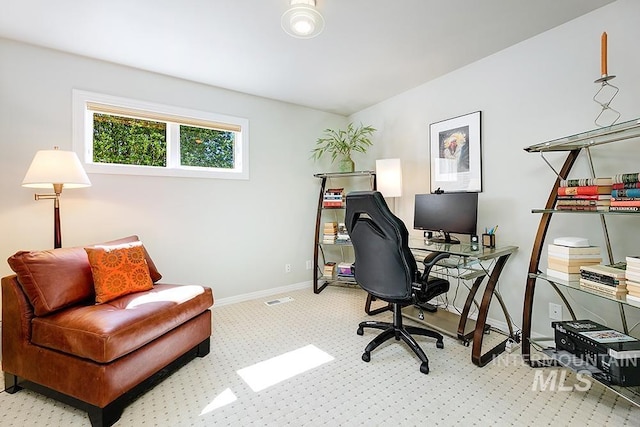office area with carpet and baseboards