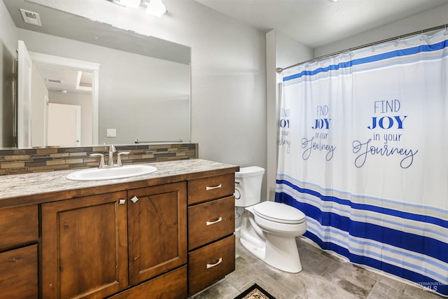 bathroom with visible vents, toilet, vanity, a shower with curtain, and backsplash