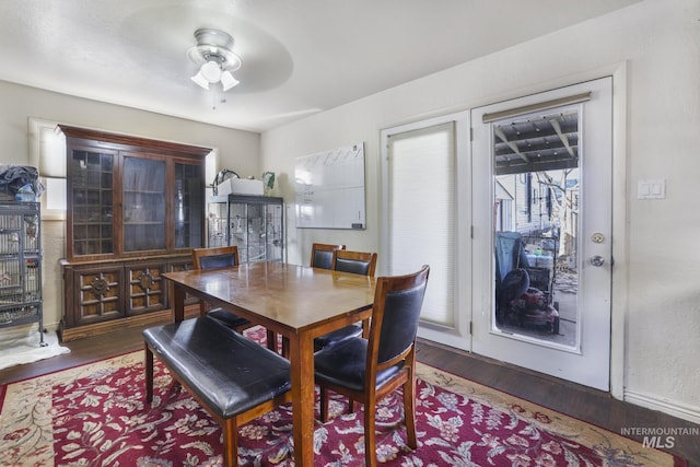 dining room featuring wood finished floors and ceiling fan