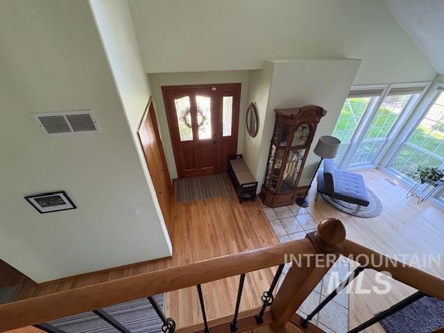 3707 N Jullion Way, Boise, ID 83704 - foyer featuring plenty of natural light, wood finished floors, and high vaulted ceiling
