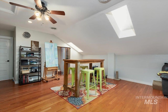 204 7th Ave N, Twin Falls, ID 83301 - additional living space with a skylight, lofted ceiling, wood finished floors, ceiling fan, and baseboards