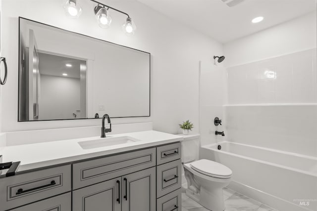 full bathroom with vanity, toilet, and shower / washtub combination