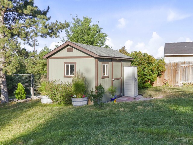 143 E Morris Ct, Kuna, ID 83634 - view of outdoor structure with a fenced backyard