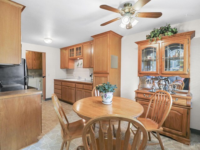 143 E Morris Ct, Kuna, ID 83634 - dining space with washing machine and clothes dryer and a ceiling fan