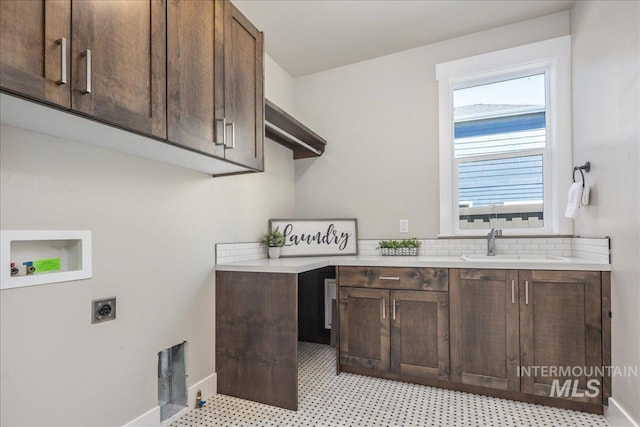 1864 N Highbury Way, Eagle, ID 83616 - laundry room with cabinet space, hookup for a washing machine, and electric dryer hookup