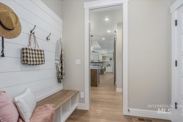 1864 N Highbury Way, Eagle, ID 83616 - mudroom featuring light wood-type flooring, recessed lighting, and a ceiling fan