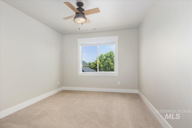 1864 N Highbury Way, Eagle, ID 83616 - unfurnished room with light colored carpet and a ceiling fan