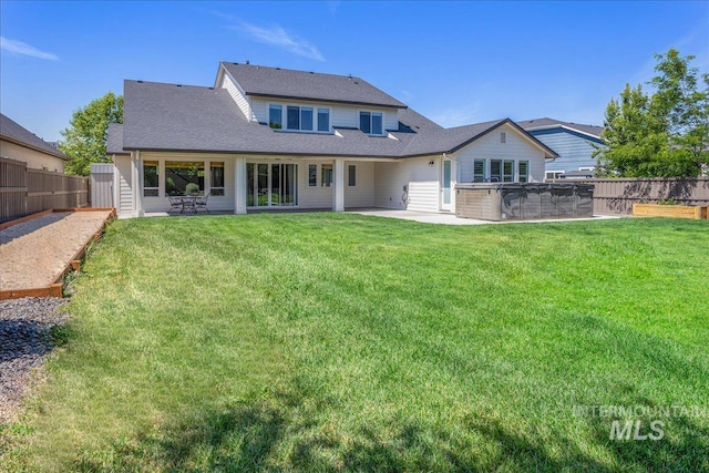 1864 N Highbury Way, Eagle, ID 83616 - back of property with a patio area and a shingled roof