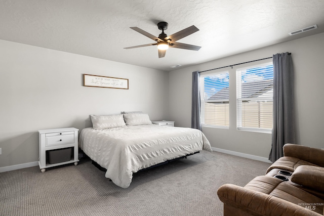 bedroom featuring baseboards, visible vents, carpet flooring, and ceiling fan