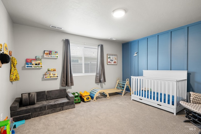carpeted bedroom with visible vents