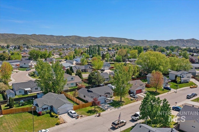 bird's eye view with a residential view and a mountain view