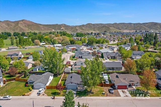 aerial view featuring a residential view and a mountain view