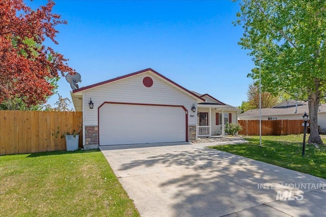 single story home with a garage, fence, stone siding, a front yard, and concrete driveway