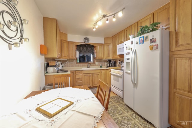 kitchen featuring white appliances, tile countertops, sink, and decorative backsplash