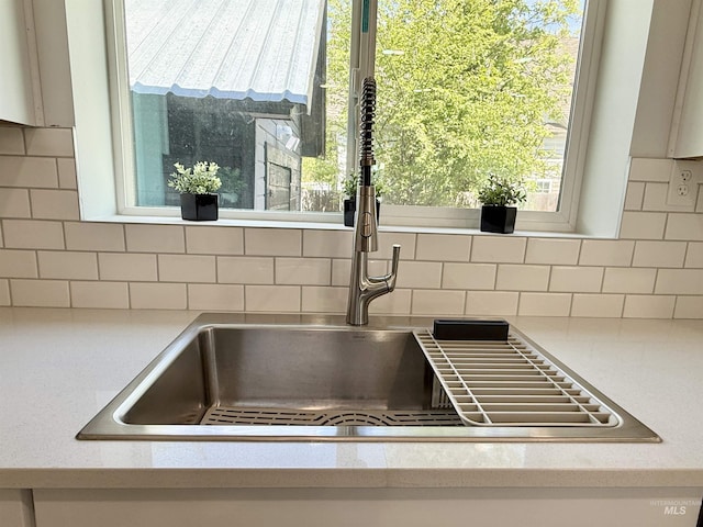 304 N C St, Grangeville, ID 83530 - kitchen view of tasteful backsplash and a sink