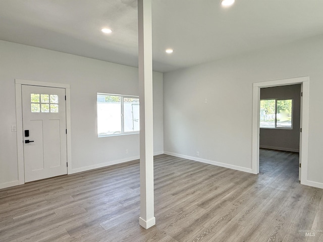 304 N C St, Grangeville, ID 83530 - entrance foyer with plenty of natural light, light wood finished floors, baseboards, and recessed lighting