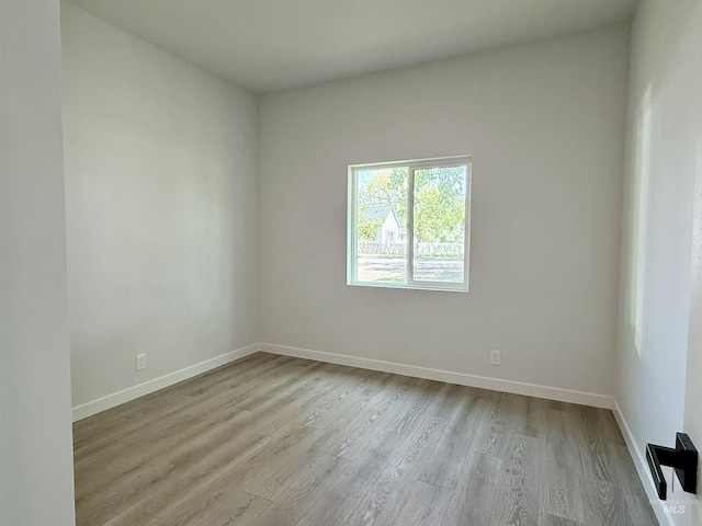 304 N C St, Grangeville, ID 83530 - empty room featuring wood finished floors and baseboards