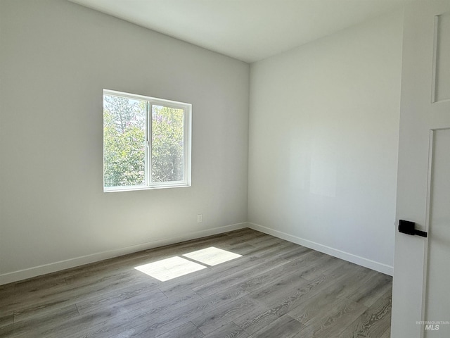 304 N C St, Grangeville, ID 83530 - spare room with wood finished floors and baseboards