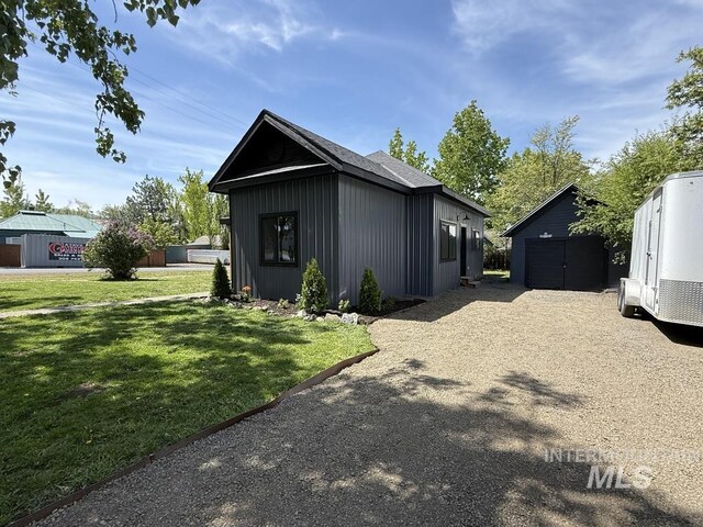 304 N C St, Grangeville, ID 83530 - view of front facade featuring a front lawn and an outdoor structure
