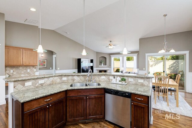 1928 E Mountain Man Dr, Meridian, ID 83646 - kitchen with ceiling fan, visible vents, wood finished floors, dishwasher, and a sink