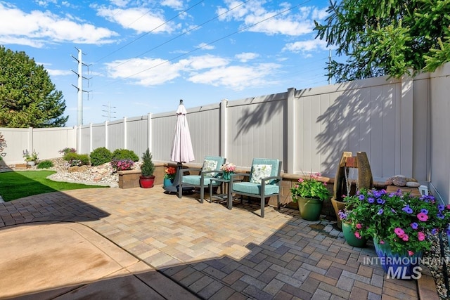 1928 E Mountain Man Dr, Meridian, ID 83646 - view of patio / terrace featuring a fenced backyard
