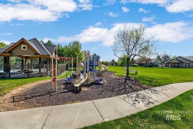 1928 E Mountain Man Dr, Meridian, ID 83646 - community jungle gym with fence and a lawn
